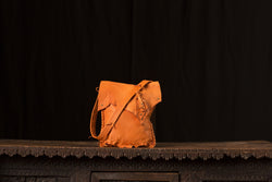 Soft Orange Leather with Brass colored Studs